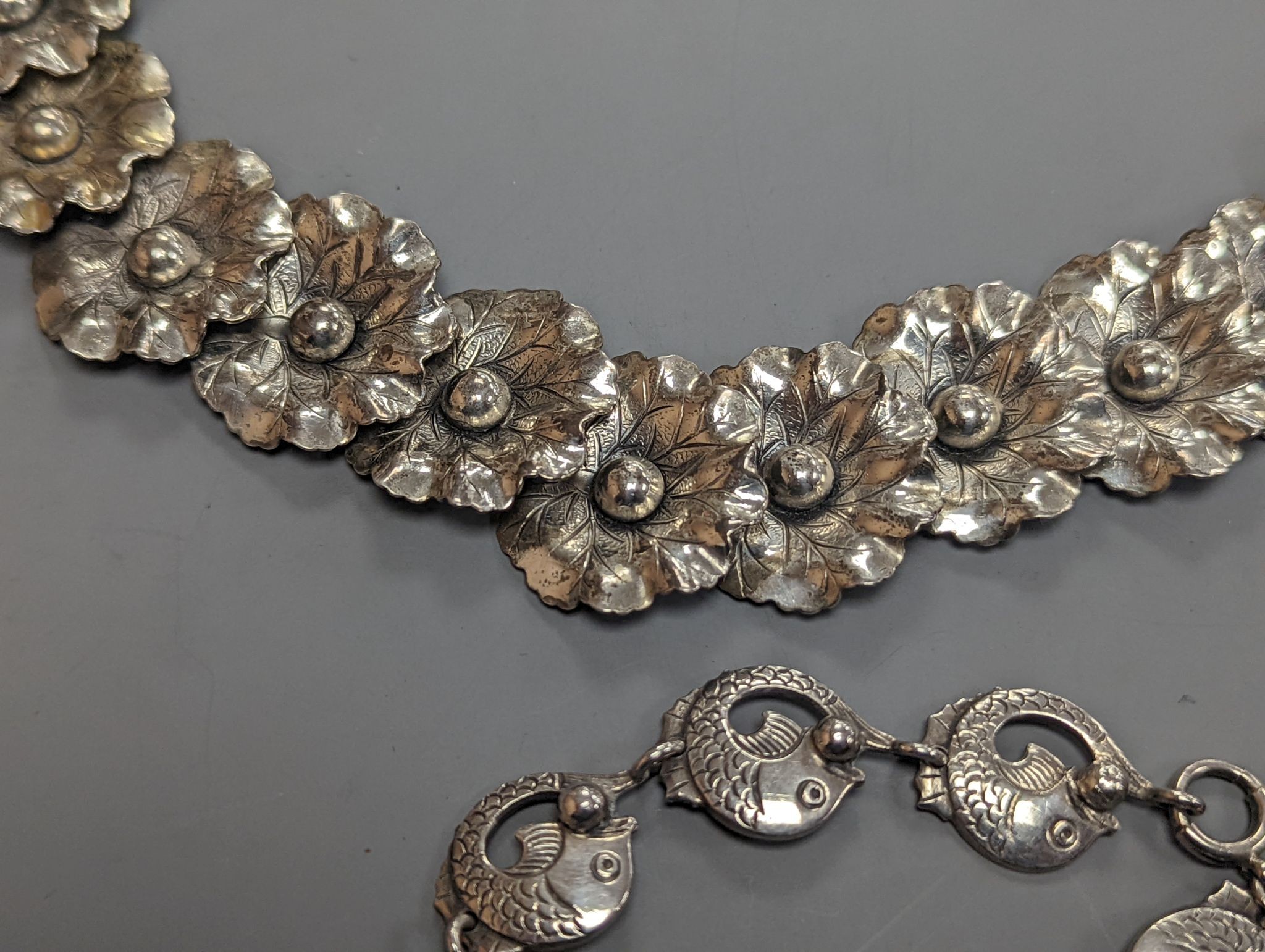 A Danecraft sterling flower head link necklace, 42cm and a Danish sterling fish link bracelet.